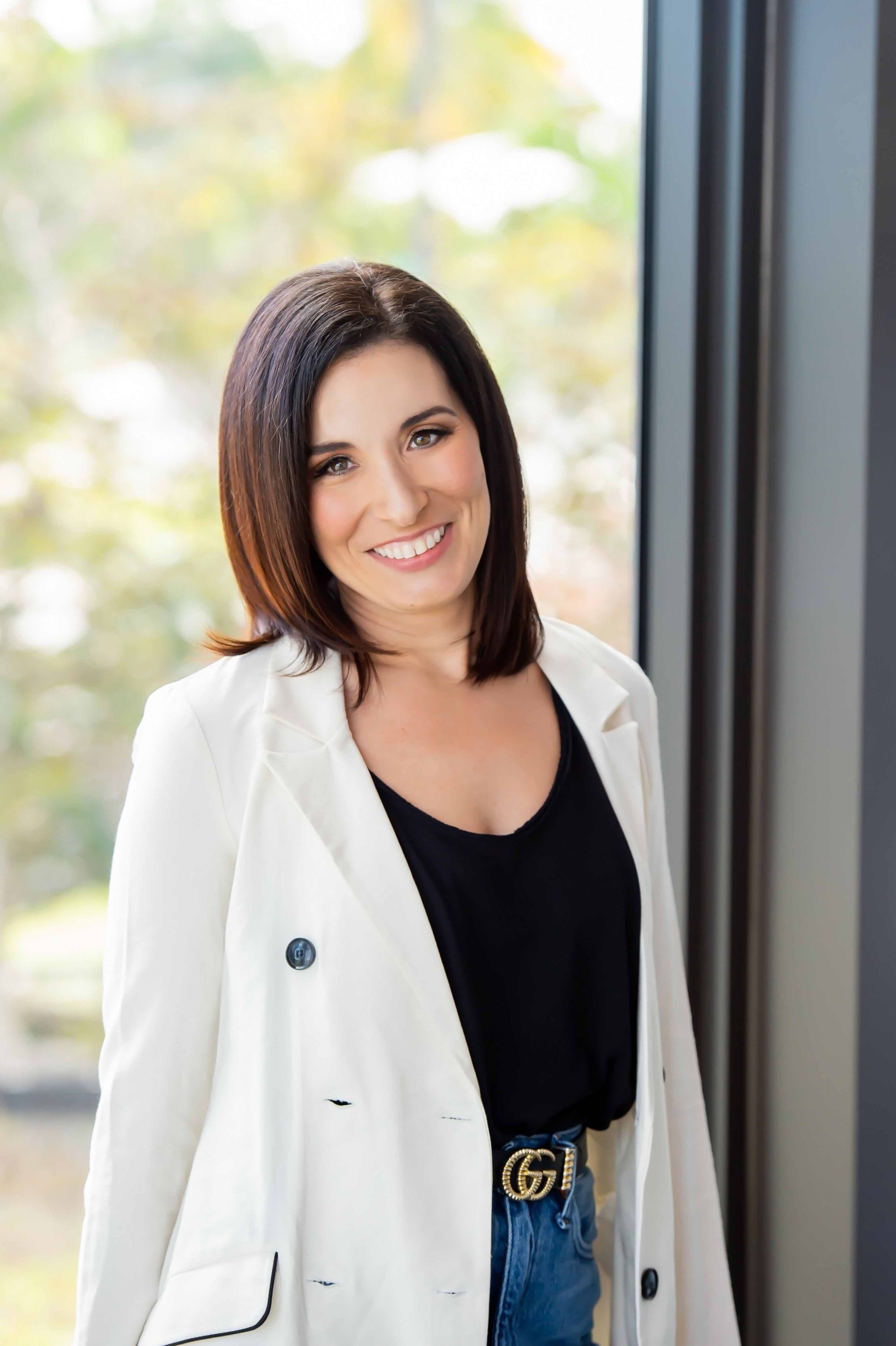 Grey silhouette of a person, head is a circle, body is an oval.