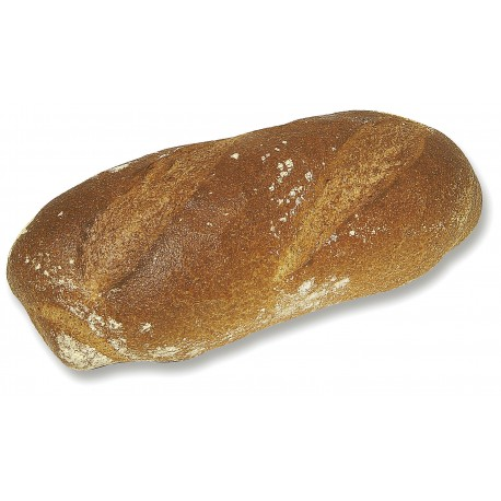 Pain complet à la croûte croustillante et à la farine visible.