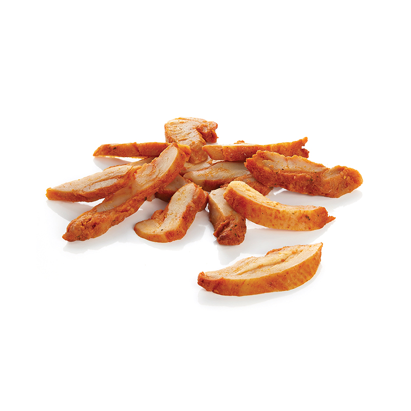 Morceaux de poulet cuits et coupés en tranches, légèrement dorés