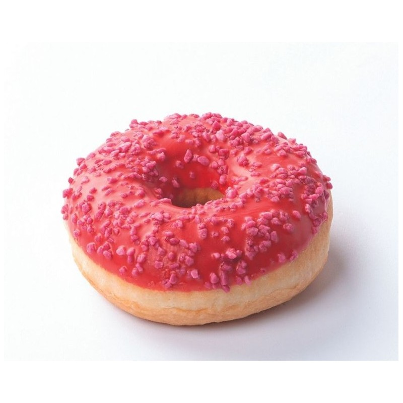 Beignet rose glacé avec des vermicelles sur fond blanc.