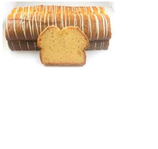 Gâteau en tranches nappé de glaçage blanc. Une tranche au premier plan, les autres à l'arrière-plan.