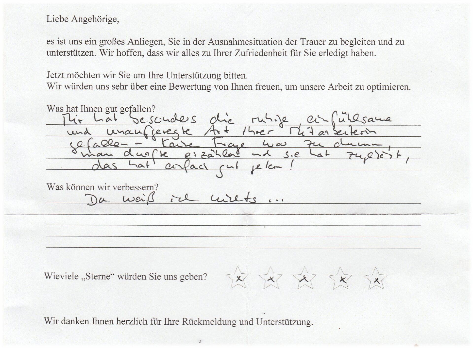 Ein handschriftlicher Kundenfeedbackbogen in deutscher Sprache mit Sternen zur Bewertung.