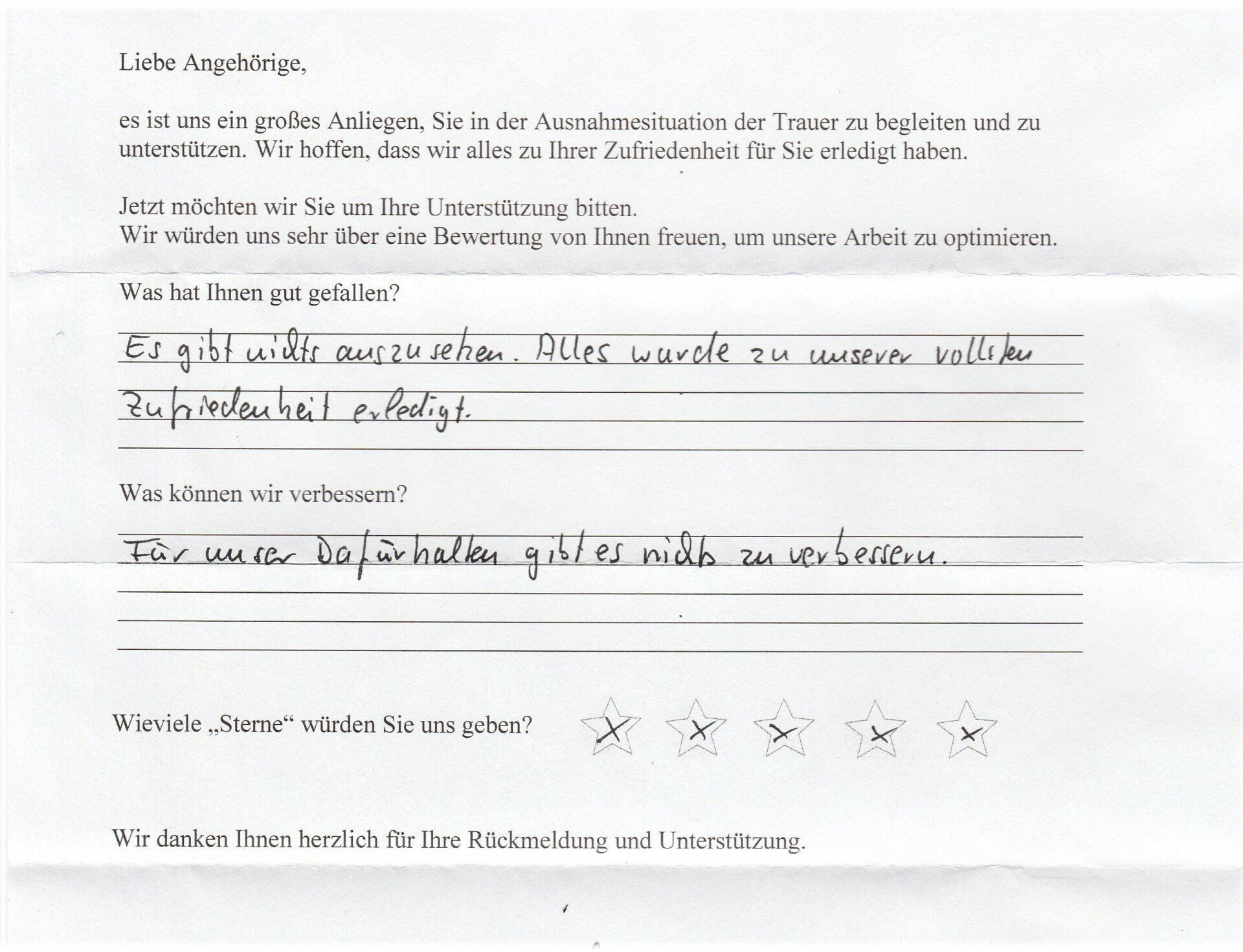 Ein handschriftliches deutsches Kundenfeedbackformular mit Textfeldern und Sternebewertung.