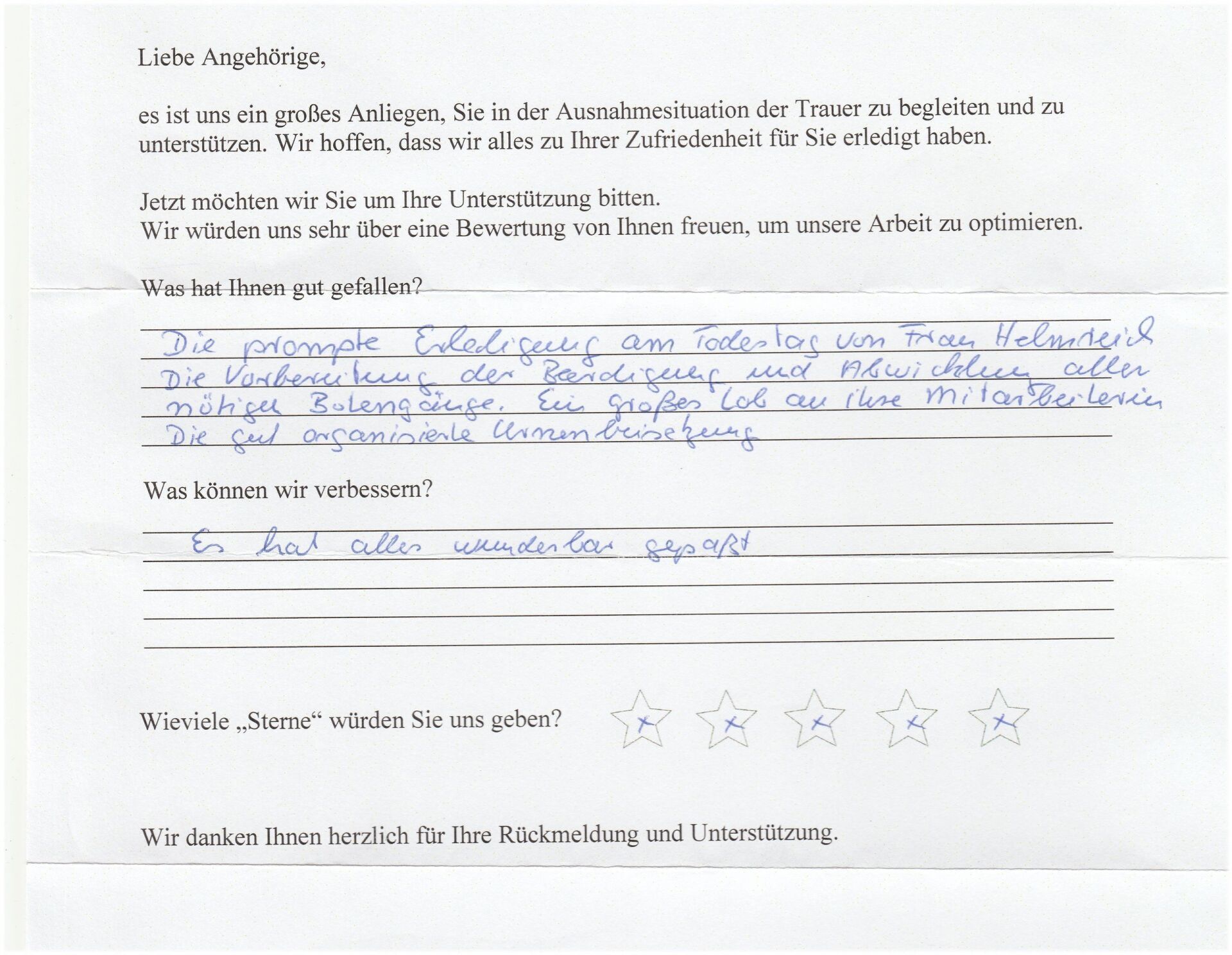 Ein handschriftlicher Kundenfeedbackbogen mit deutschem Text, unten befindet sich eine Bewertungsskala mit Sternen.
