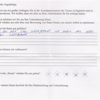 Feedback form with handwritten comments. One box reads,