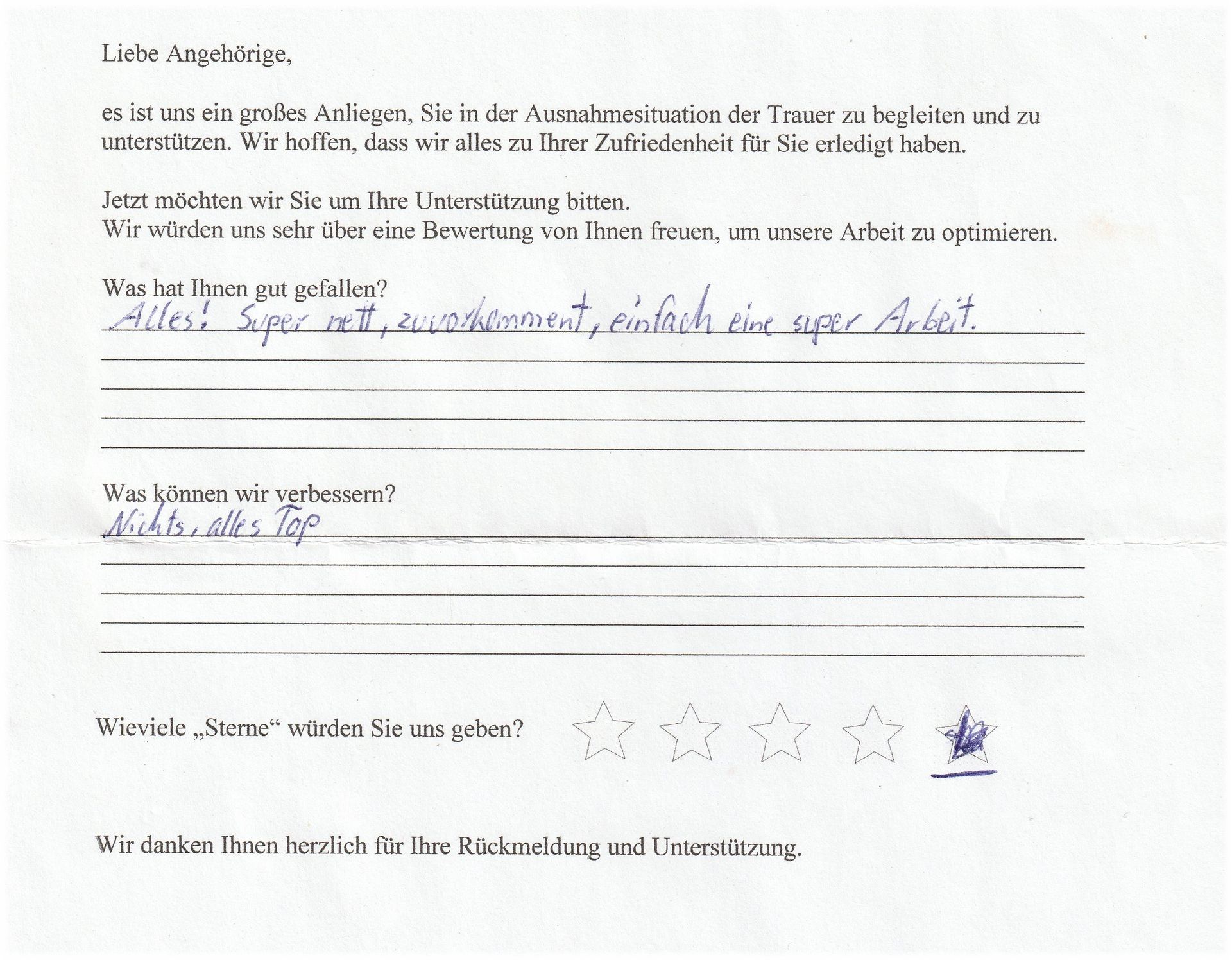 Deutsches Feedbackformular mit handschriftlichen Kommentaren und einer Sternebewertung.