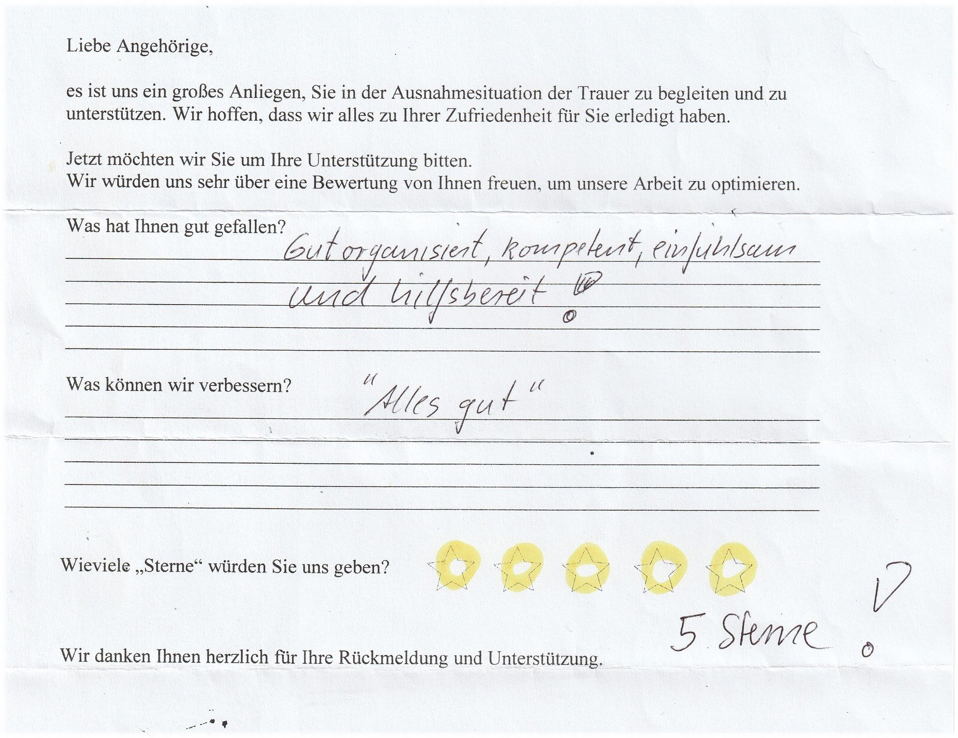 Handschriftliches Kundenfeedbackformular mit Fünf-Sterne-Bewertung.
