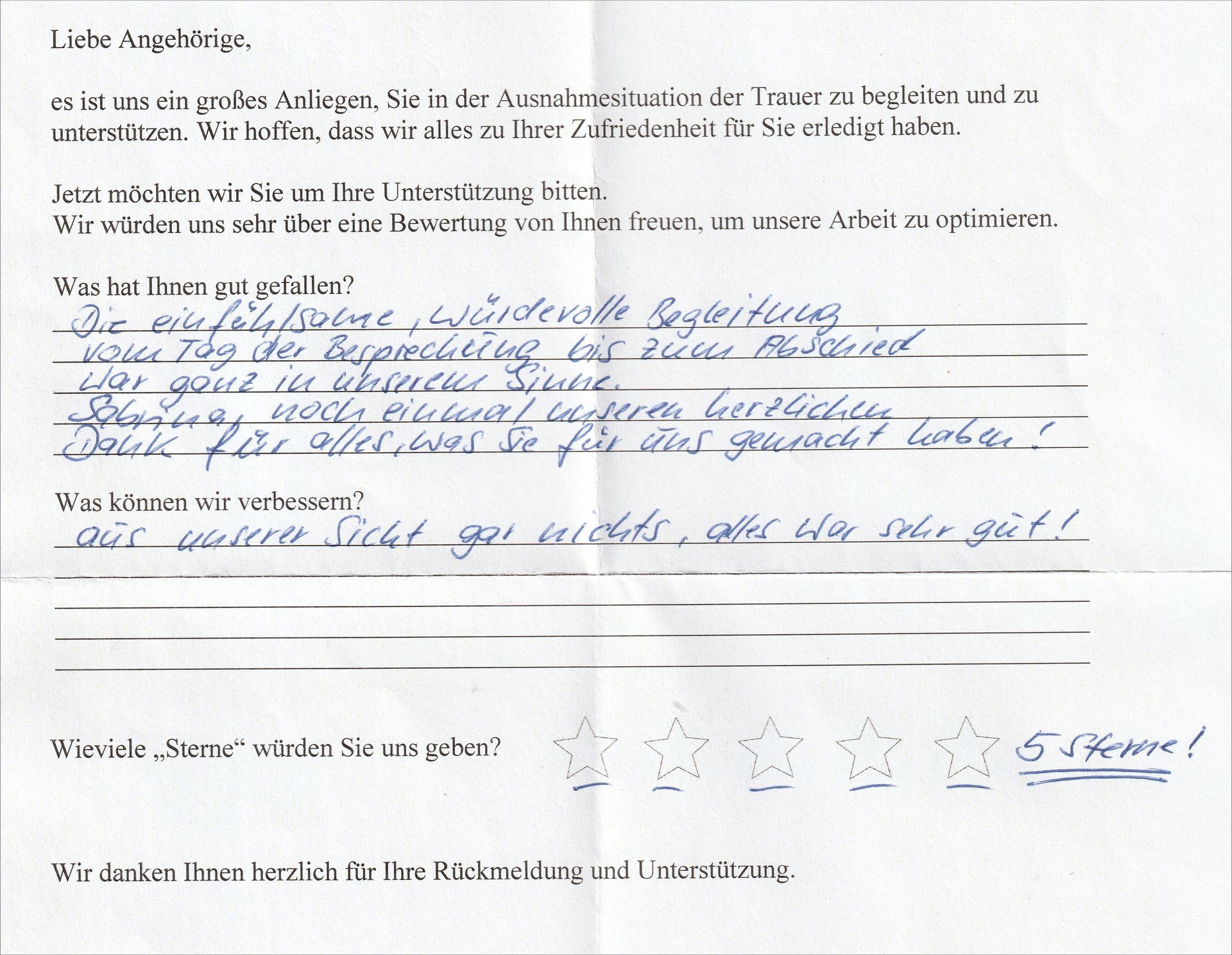 Handschriftliche Notiz mit deutschem Text, positivem Feedback und 5-Sterne-Bewertung.