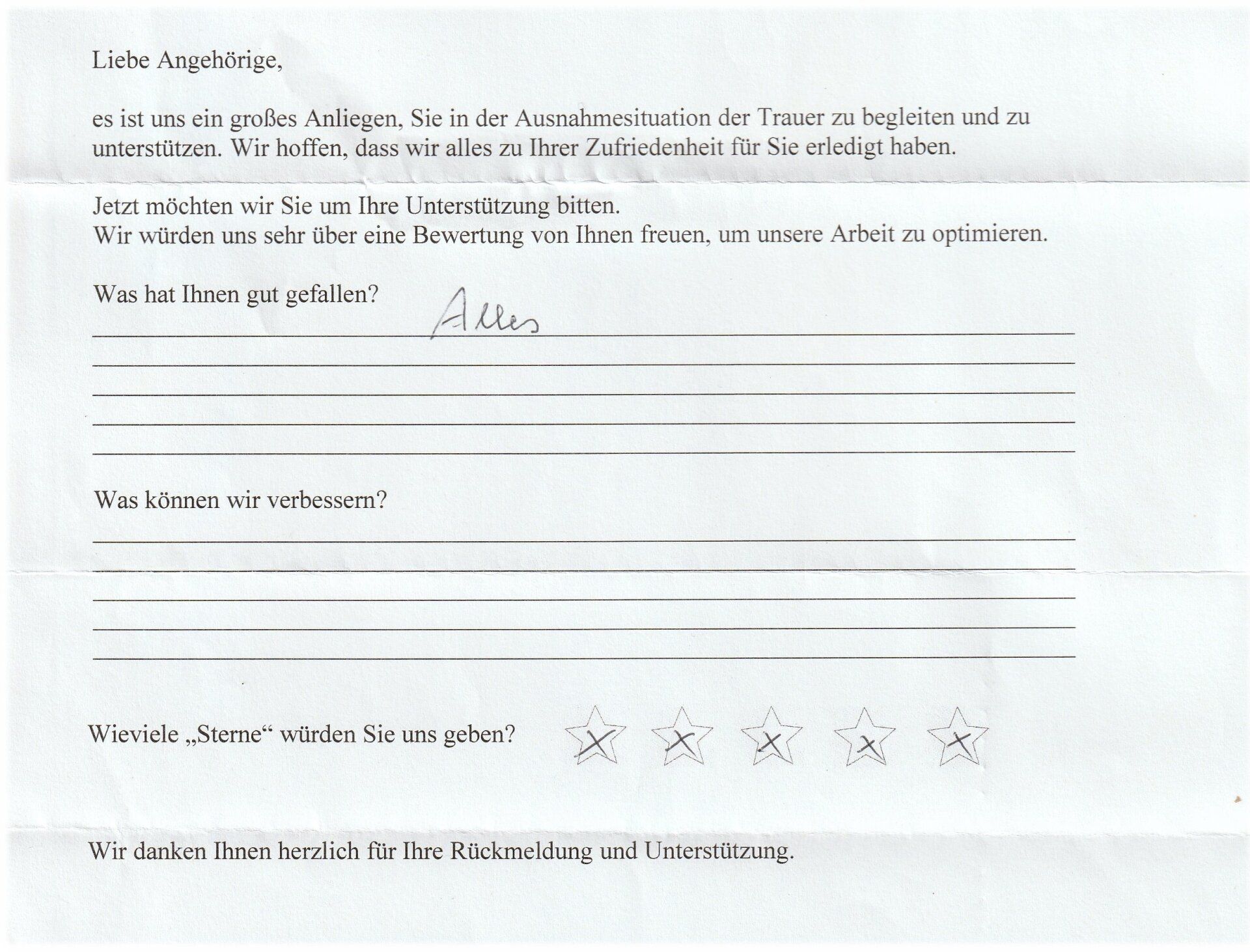 Ein Umfrageformular mit handschriftlichen Antworten; es enthält Fragen und eine Bewertungsskala.