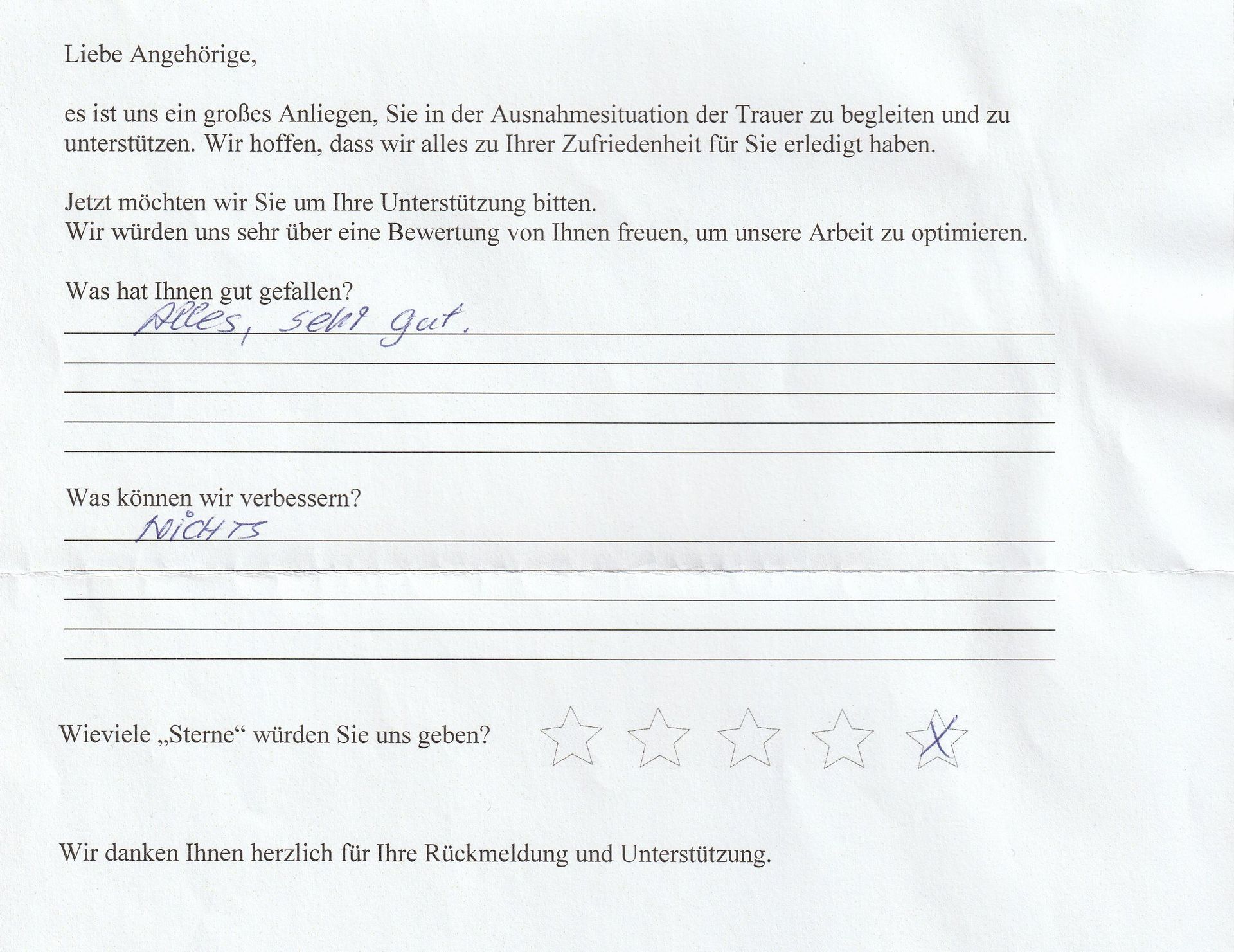 Feedback-Formular: Handschriftliche Antworten, mit einer Bewertung von drei von fünf Sternen versehen.