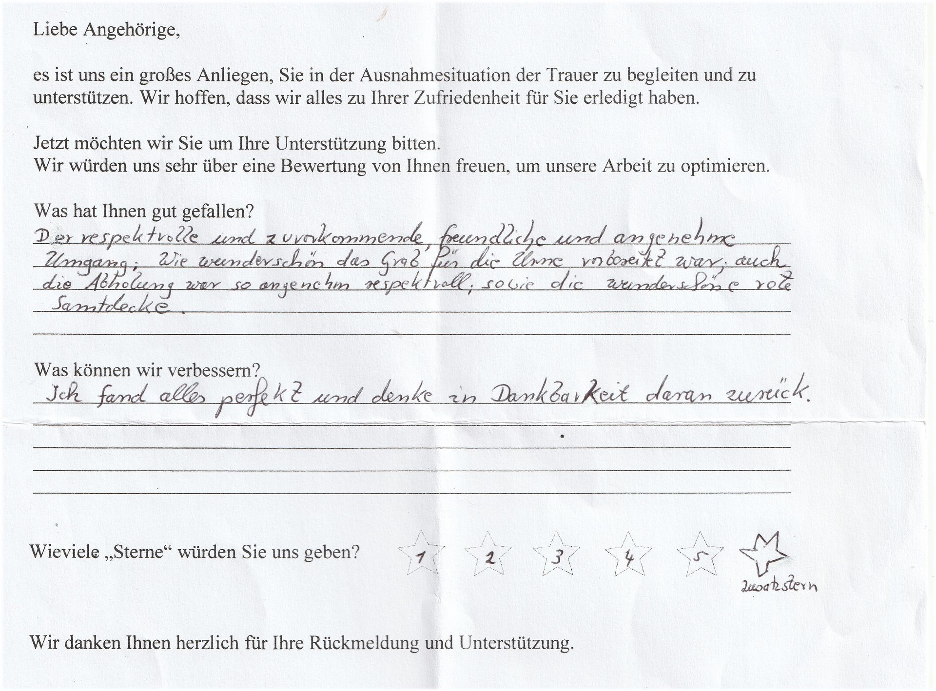 Handschriftliches Kundenfeedbackformular mit deutschem Text.