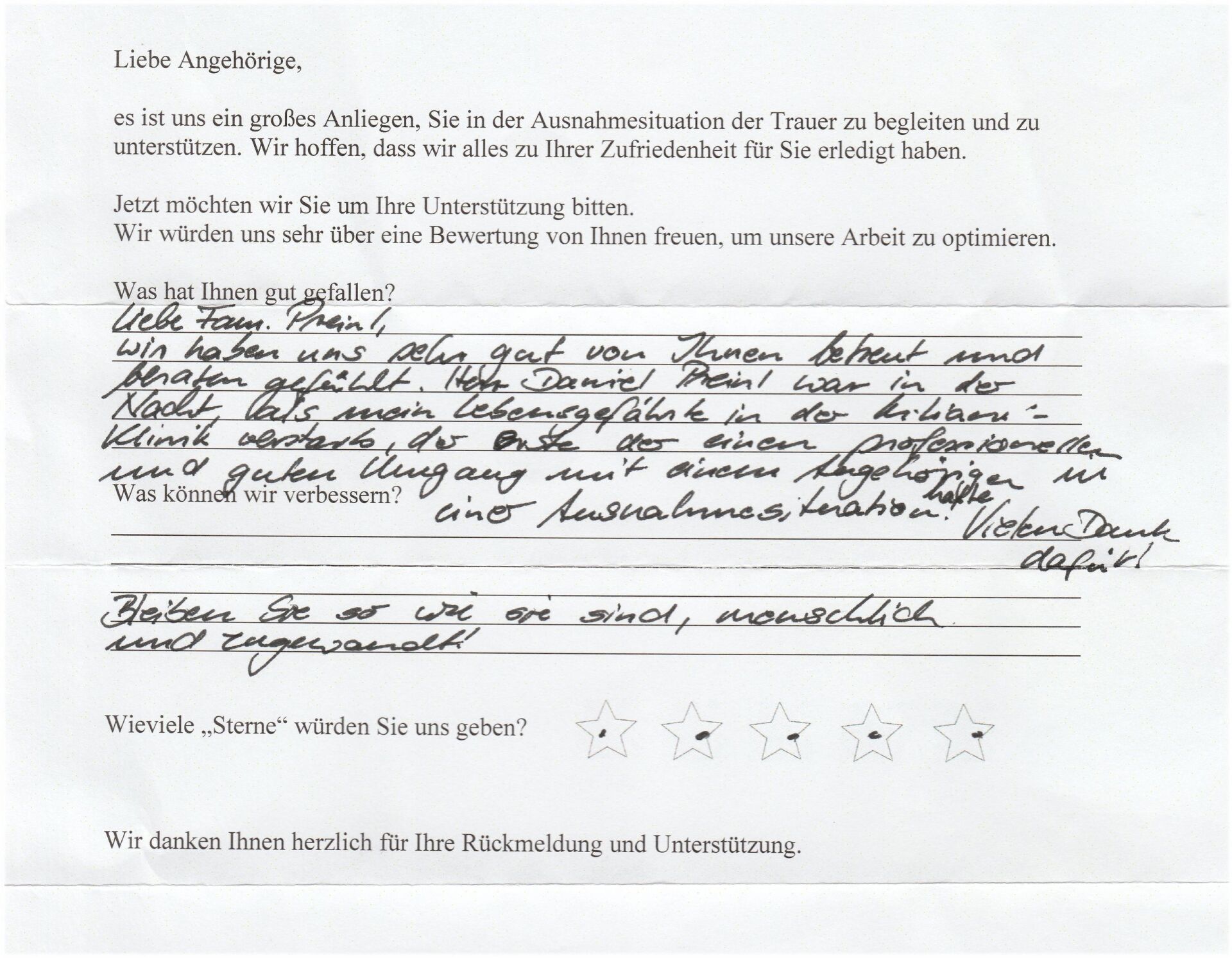 Handschriftliche Notiz mit Kundenfeedback und einer Bewertungsskala.