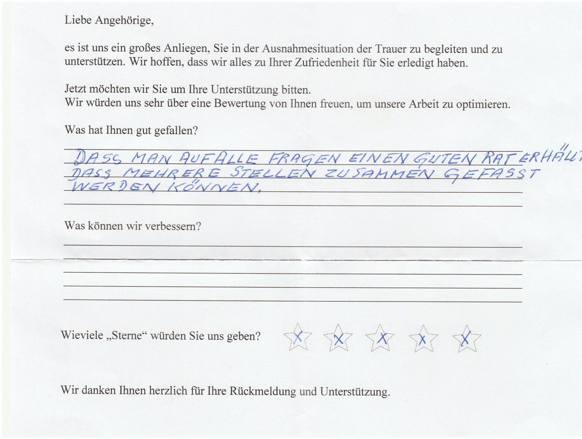 Handwritten feedback form, German text, including starred rating, with response: