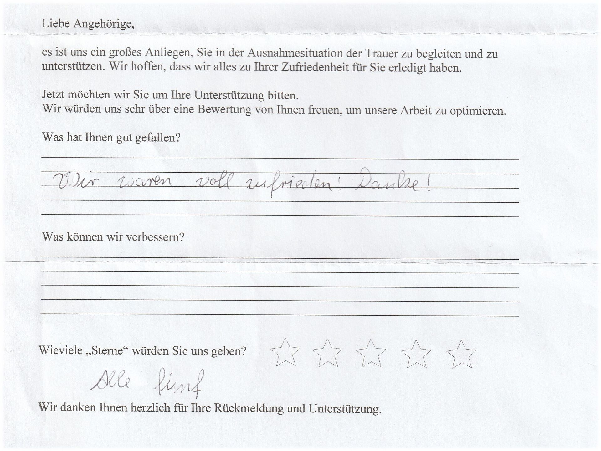 Feedback-Formular mit handschriftlichem Text und Bewertungssternen.
