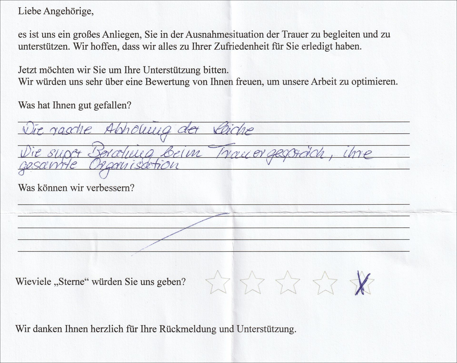 Handschriftlicher Feedbackbogen in deutscher Sprache: Service loben, Verbesserungswünsche äußern, mit 4 Sternen bewerten.