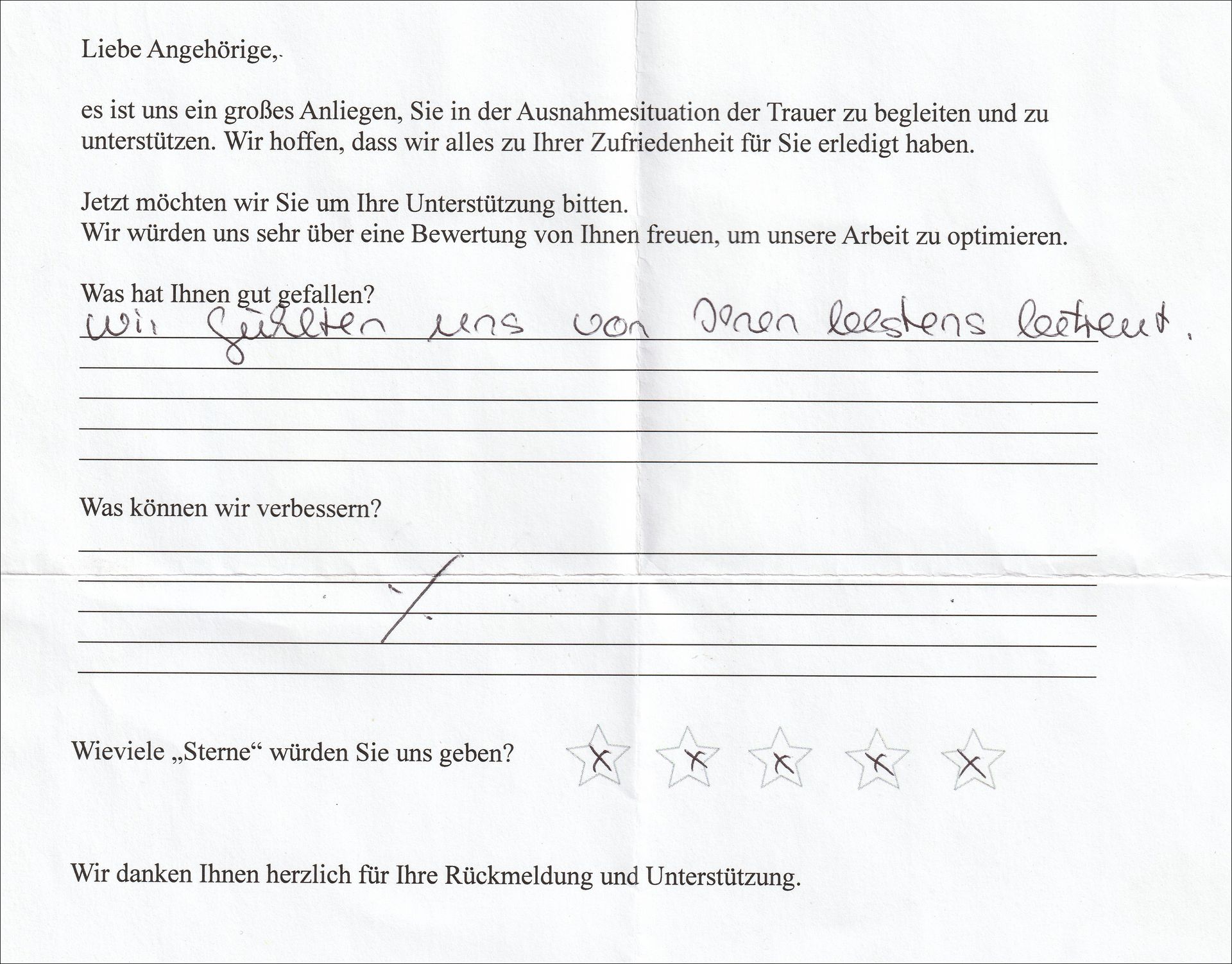 Feedback form with handwritten responses in German: