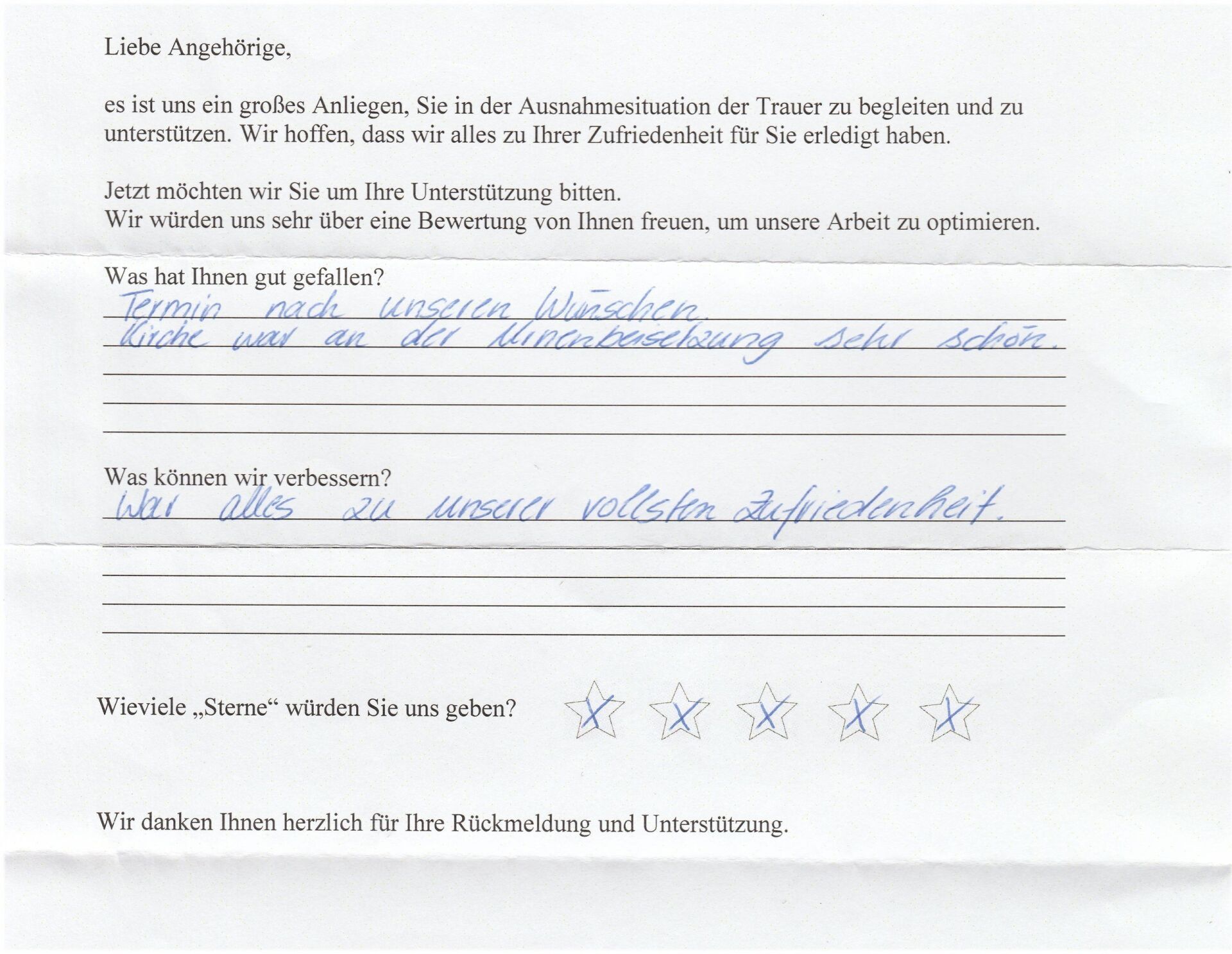 Feedback form; blue pen, handwritten answers about service. German text: