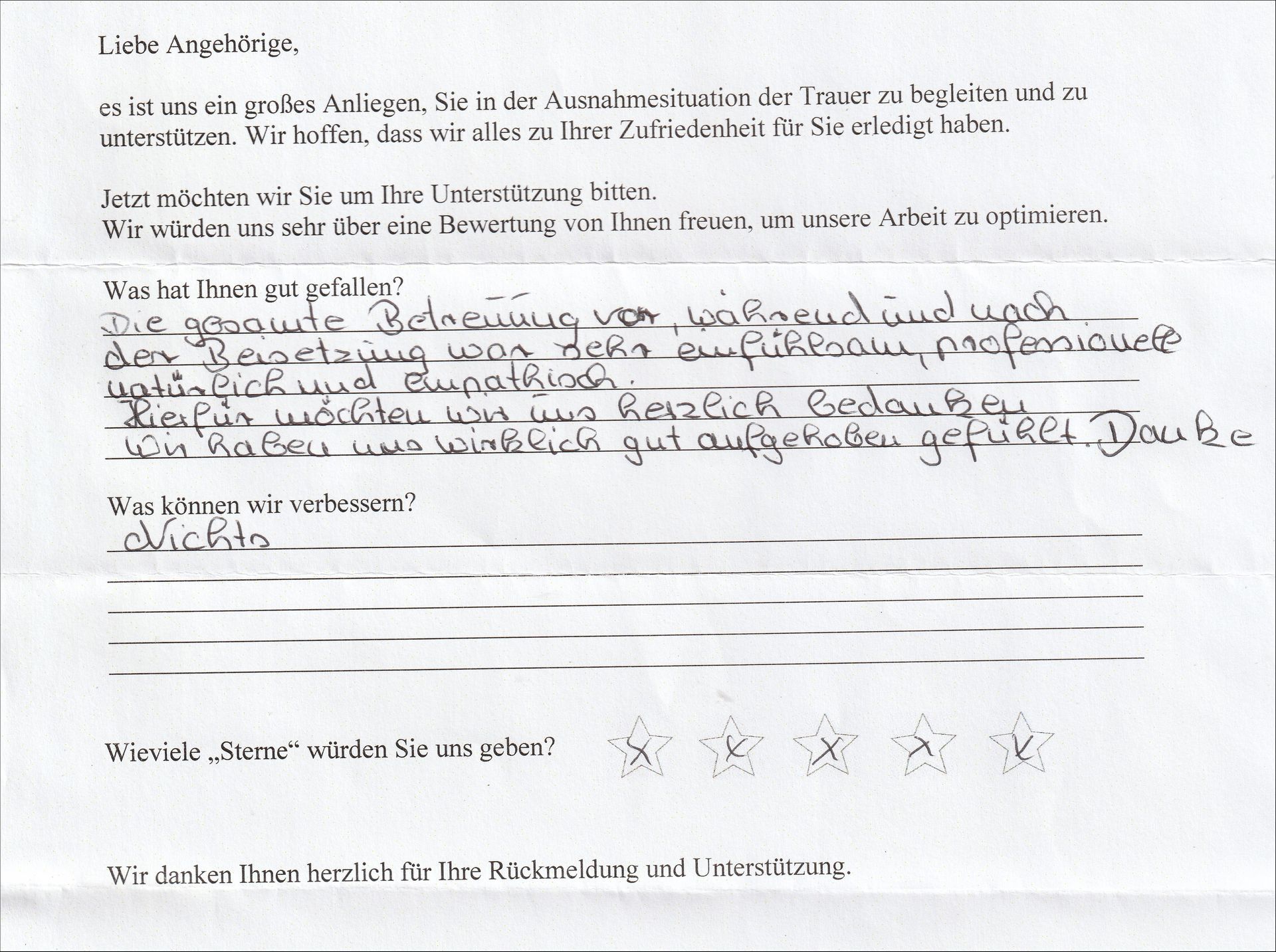 Handschriftliche Kundenbewertung einer Dienstleistung, mit deutschem Text und 5-Sterne-Bewertung.