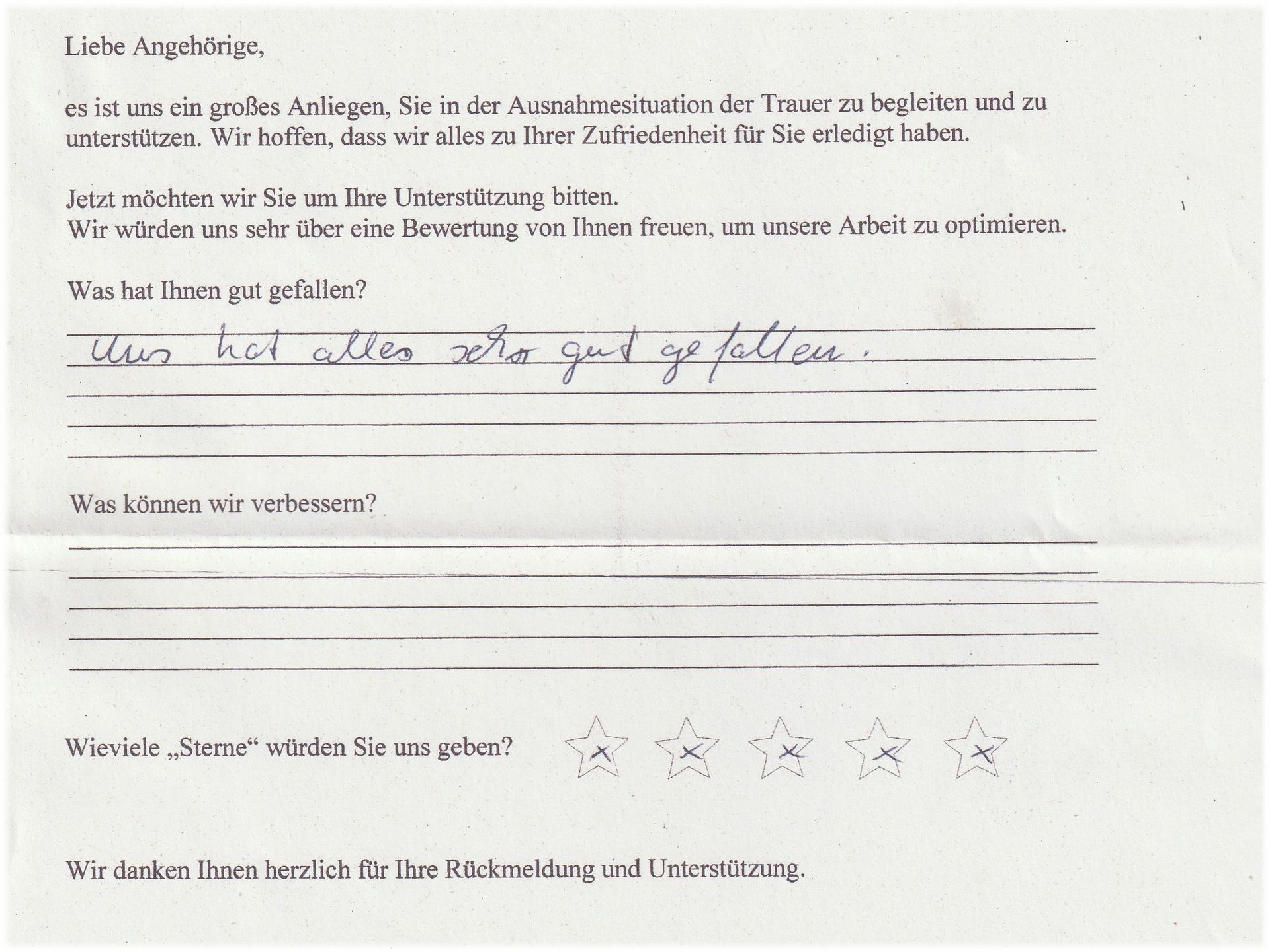 Handschriftliche Umfrage mit Textfeldern und Sternebewertung für Kundenfeedback.