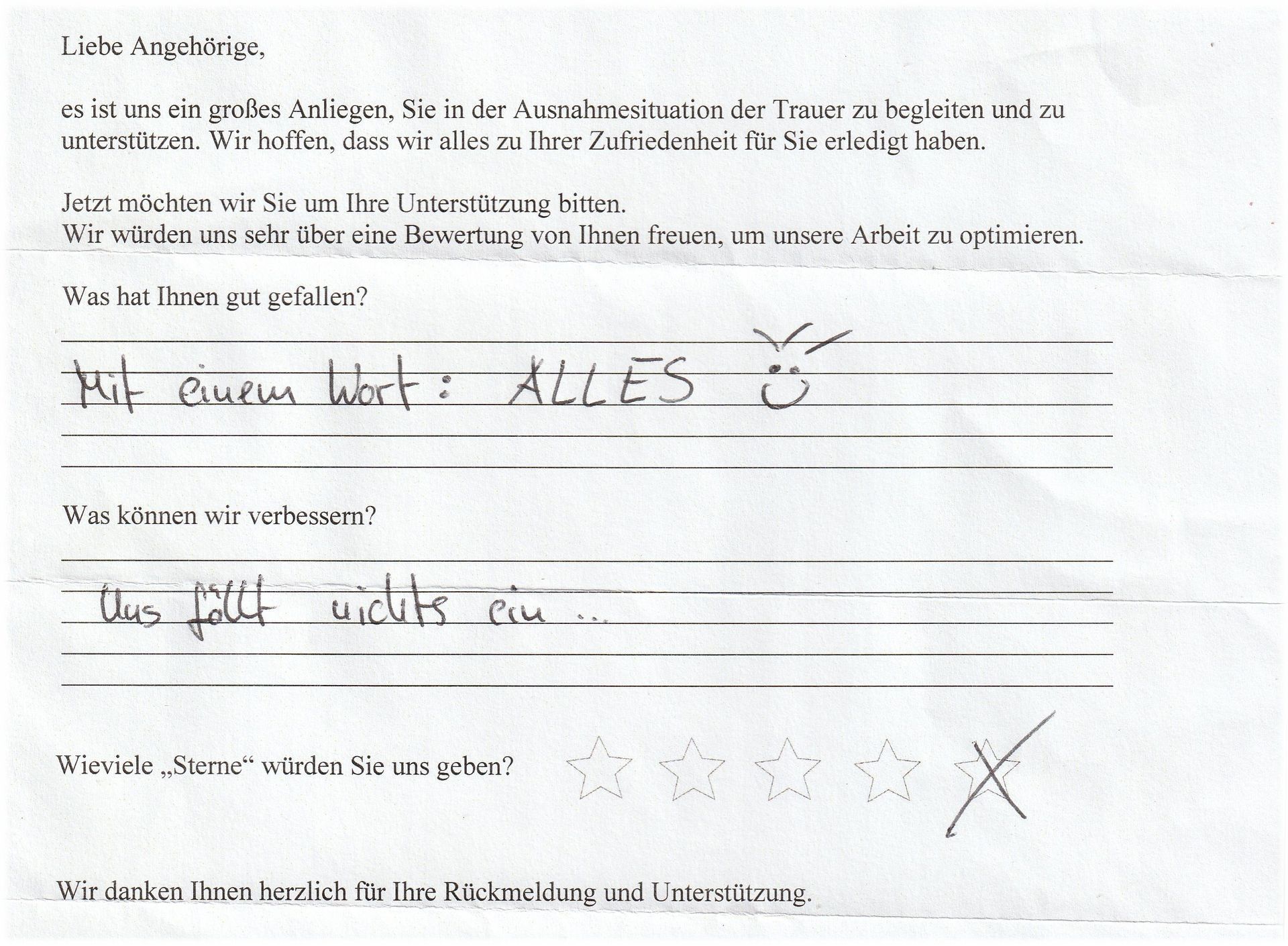 Handwritten feedback form: answers include