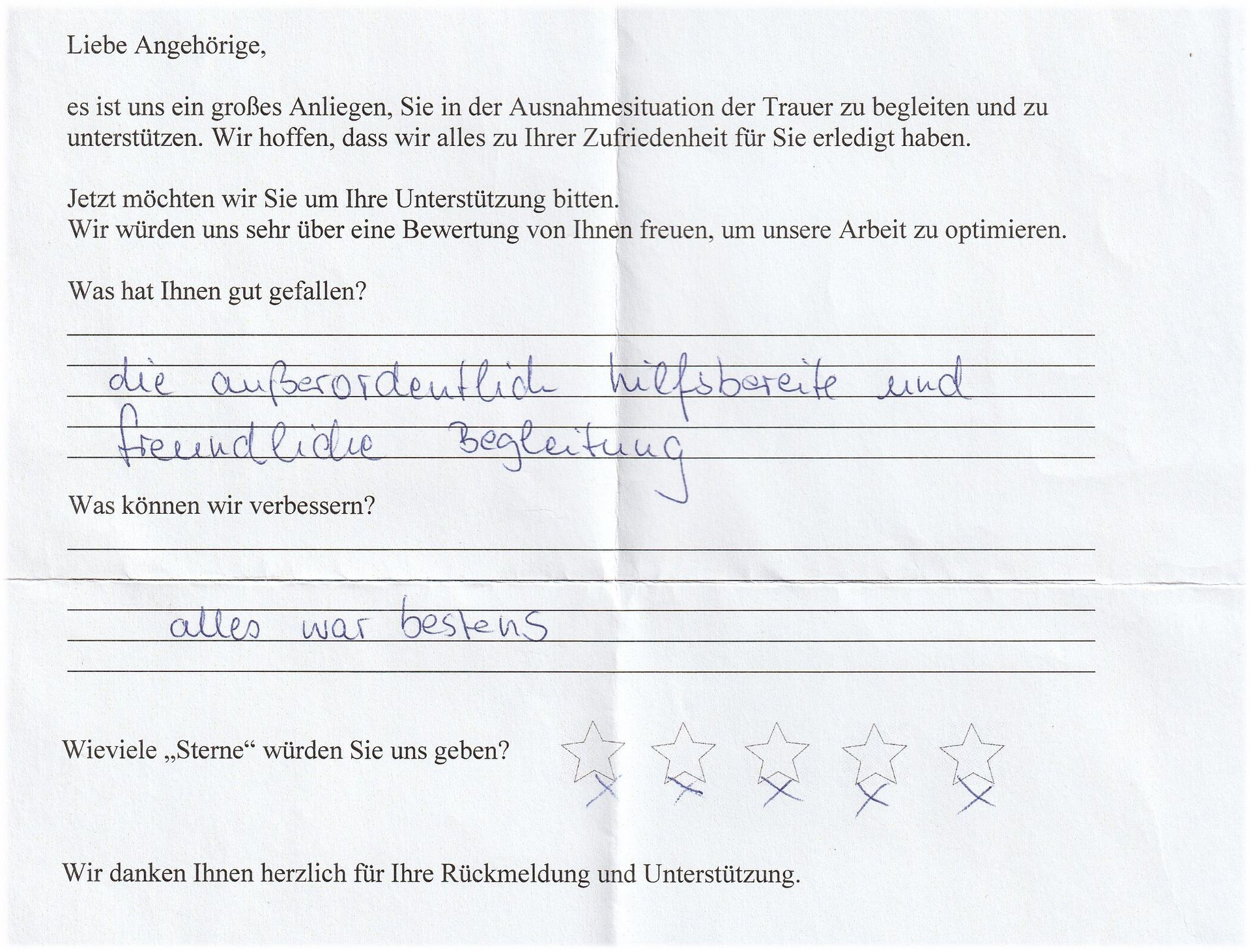 A handwritten customer feedback form with questions and responses, including