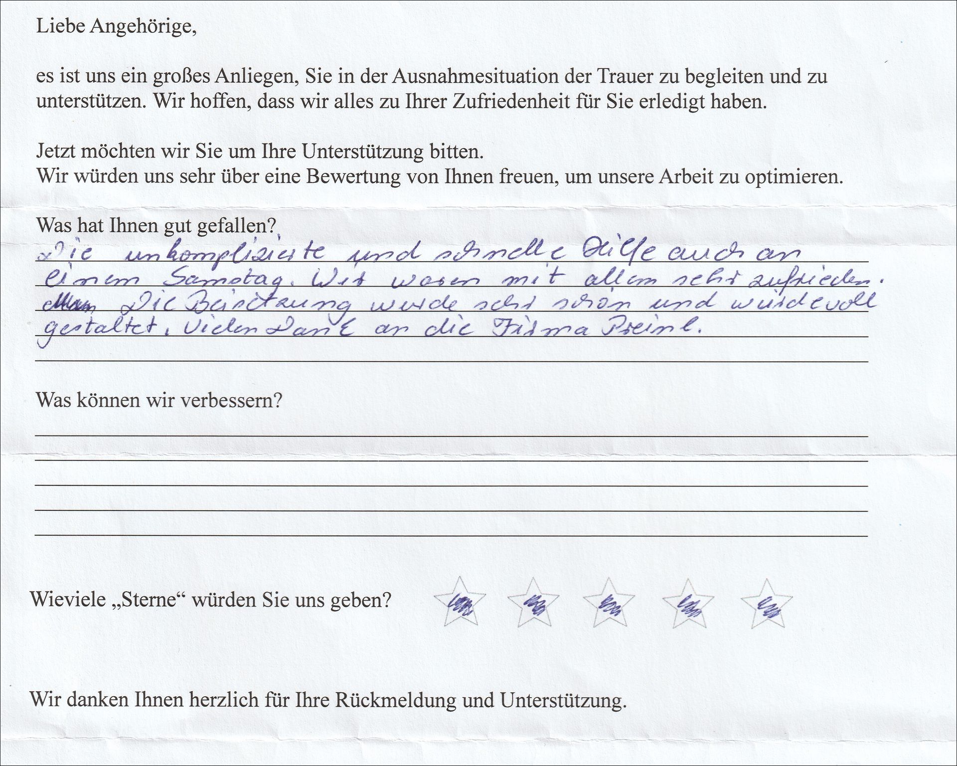 Handschriftliche Kundenbefragung mit Text und Sternebewertung, wahrscheinlich für Service-Feedback.