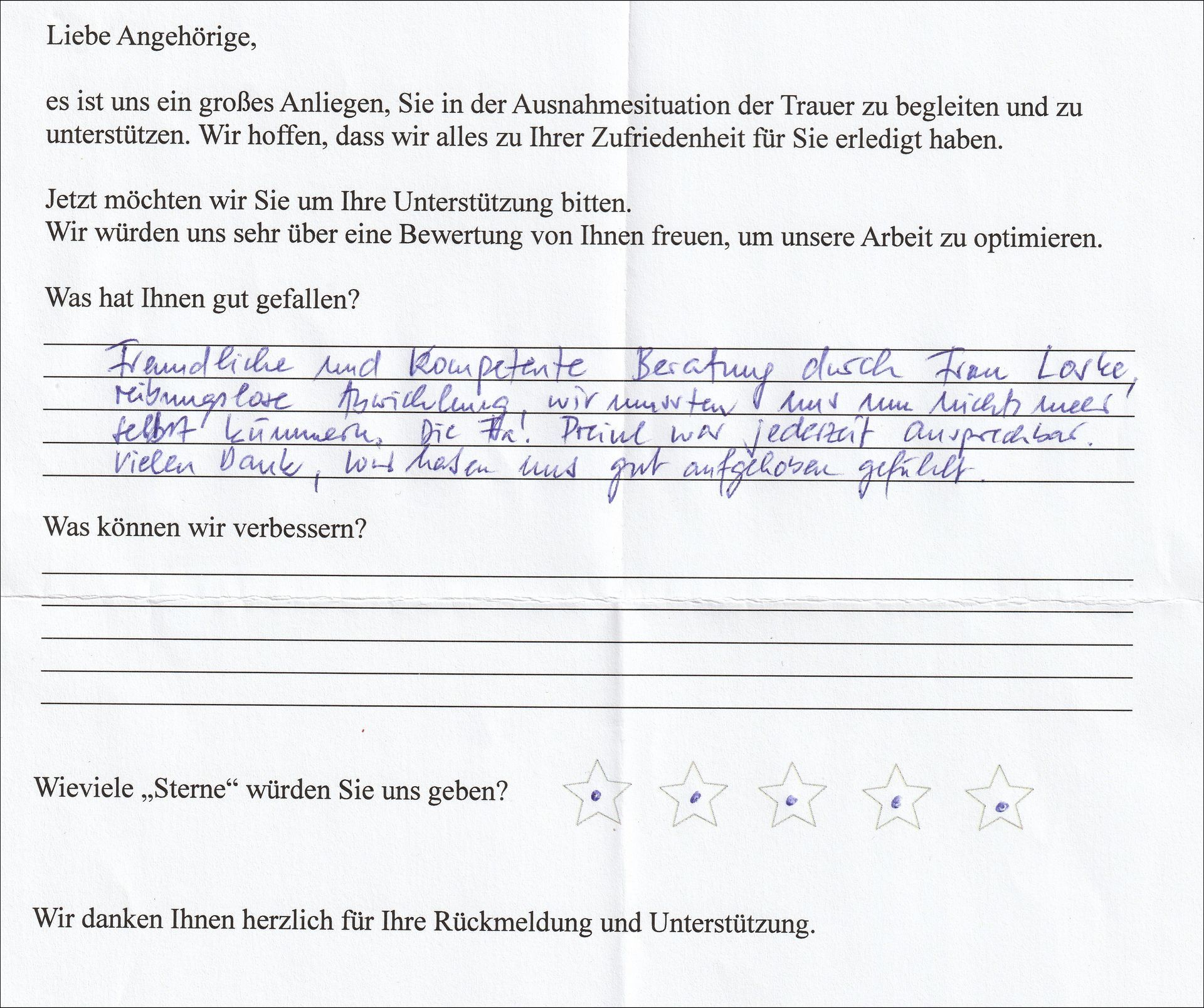Handschriftliches Kundenfeedbackformular mit Sternebewertung.