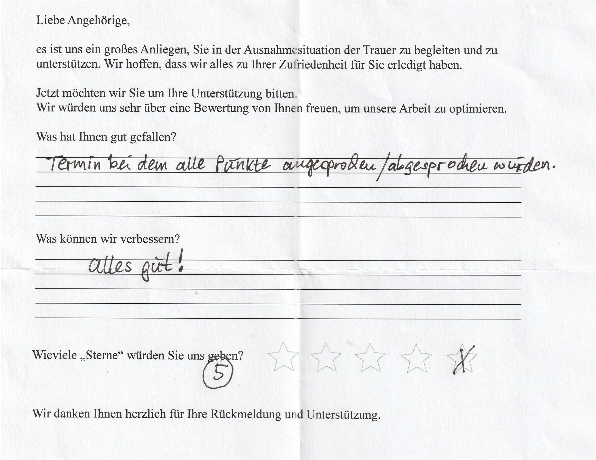 Kundenfeedbackformular mit handschriftlicher deutscher Fassung, einschließlich 5-Sterne-Bewertung und positiven Kommentaren.
