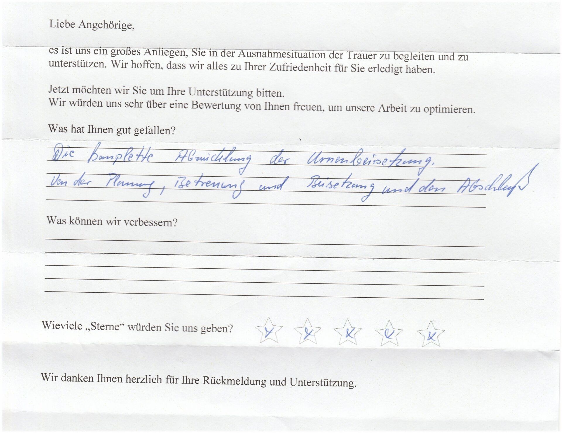 Ein handschriftliches Kundenfeedbackformular in deutscher Sprache mit Bewertungssternen und einem Abschnitt für Verbesserungsvorschläge.