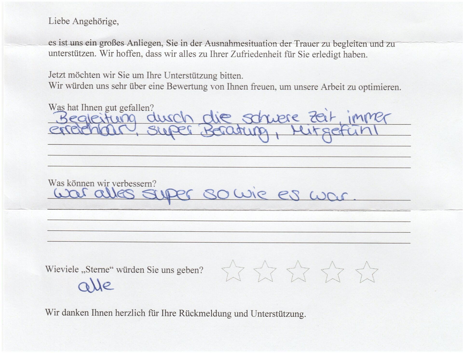 Handwritten feedback on paper: