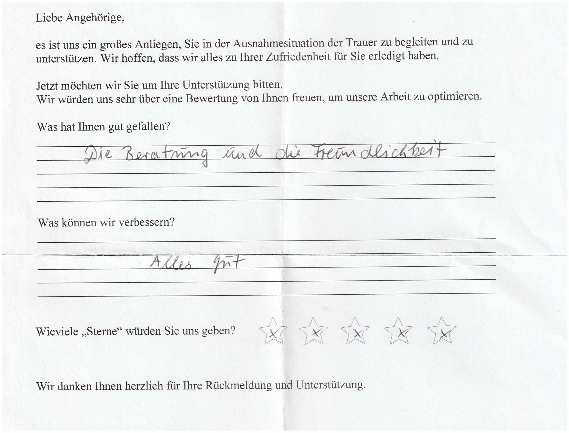 Handwritten feedback form. German text with