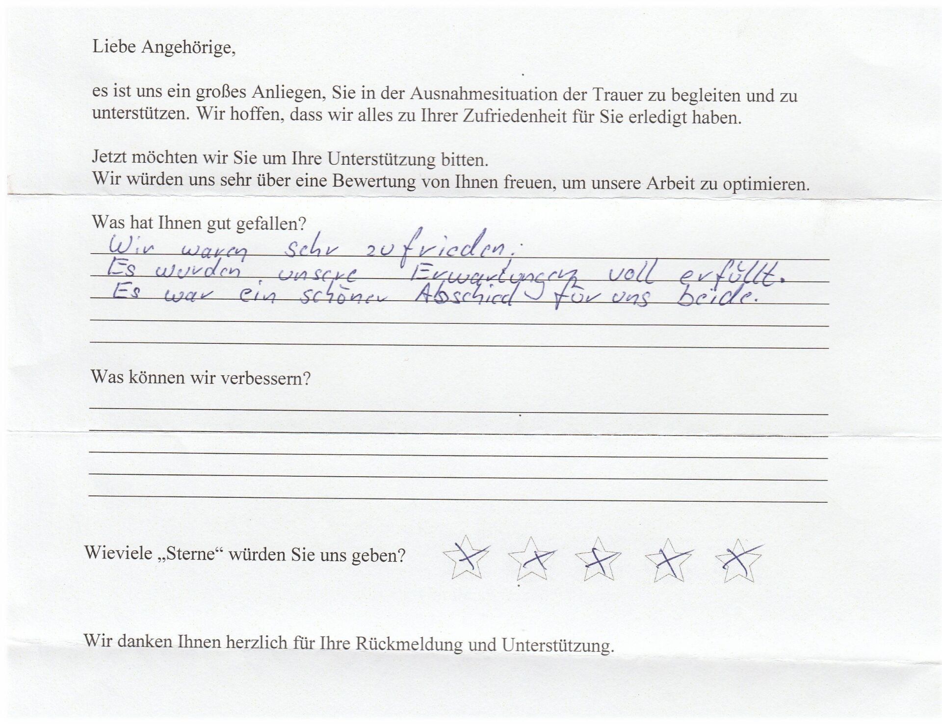 Deutsches Feedbackformular mit handschriftlichem Text und Sternebewertungen.