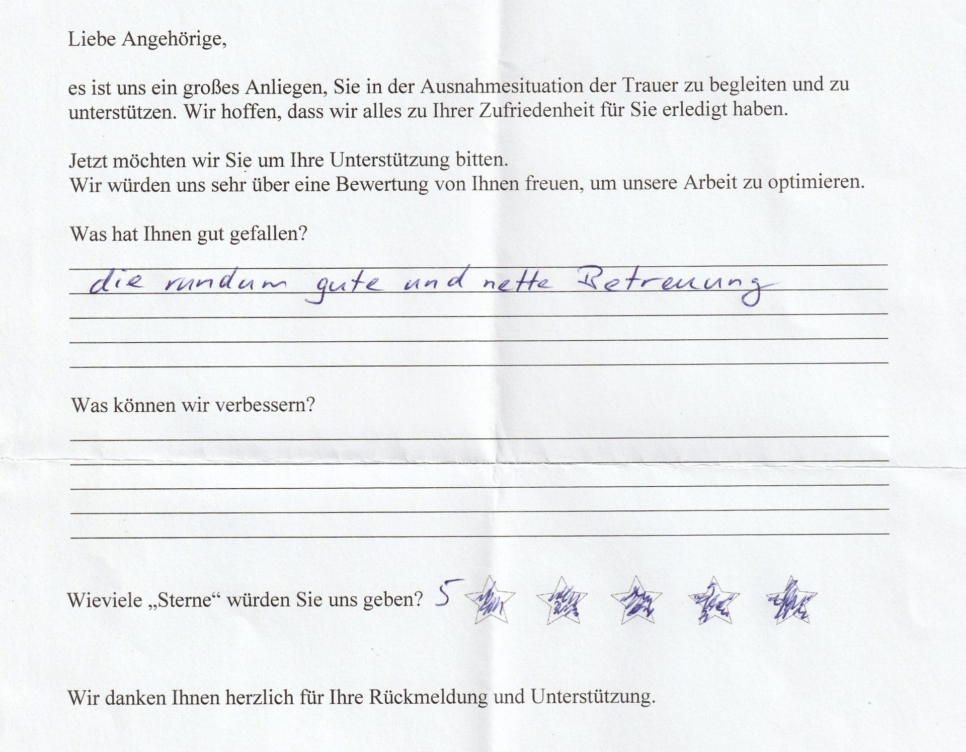 Handschriftlicher Kundenfeedbackbogen; Text in deutscher Sprache. Für die Bewertung werden fünf Sterne eingetragen.