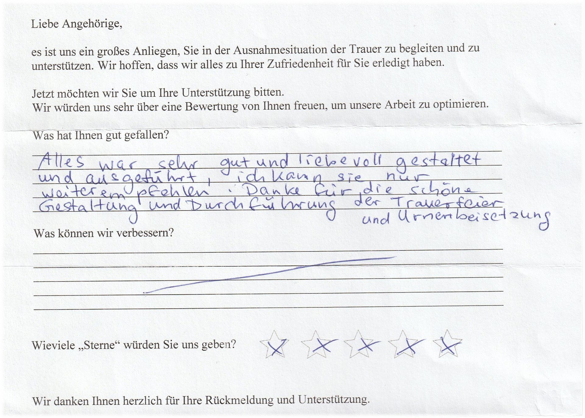 Handschriftliche Notiz mit positiver Rückmeldung: „Alles sehr gut und liebevoll erledigt“ mit 5 Sternen.