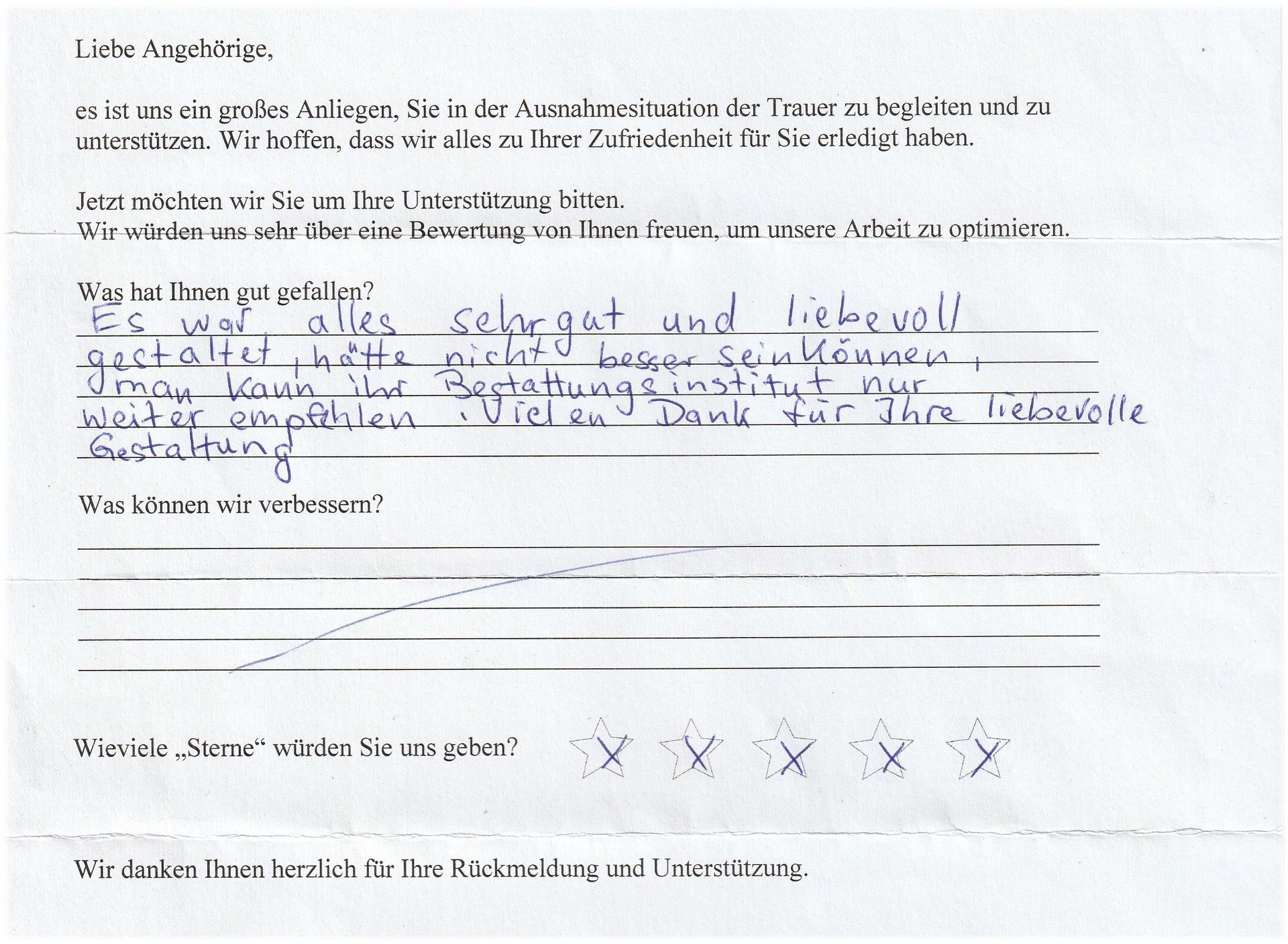 Handschriftliches Feedback auf einem Formular, Bewertung der Dienstleistung mit fünf Sternen; deutsche Sprache.