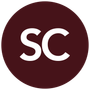 White “SC” letters on a dark maroon circular background.