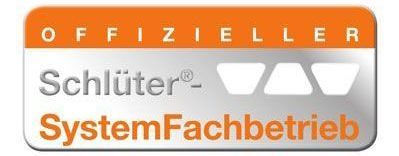 A silver and orange logo for schlüter systemfachbetrieb