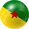 Une boule brillante ornée du drapeau de la Guyane française. Dessus vert, dessous jaune, étoile rouge.
