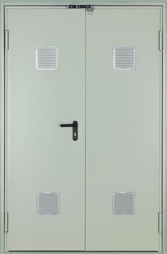 Una puerta blanca con una manija y dos rejillas de ventilación.