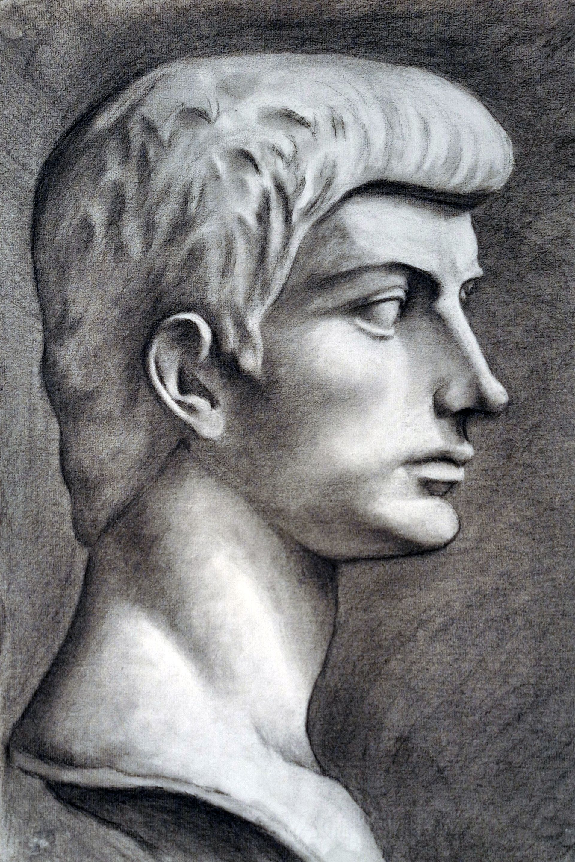 Un dibujo en blanco y negro de la cabeza de un hombre.
