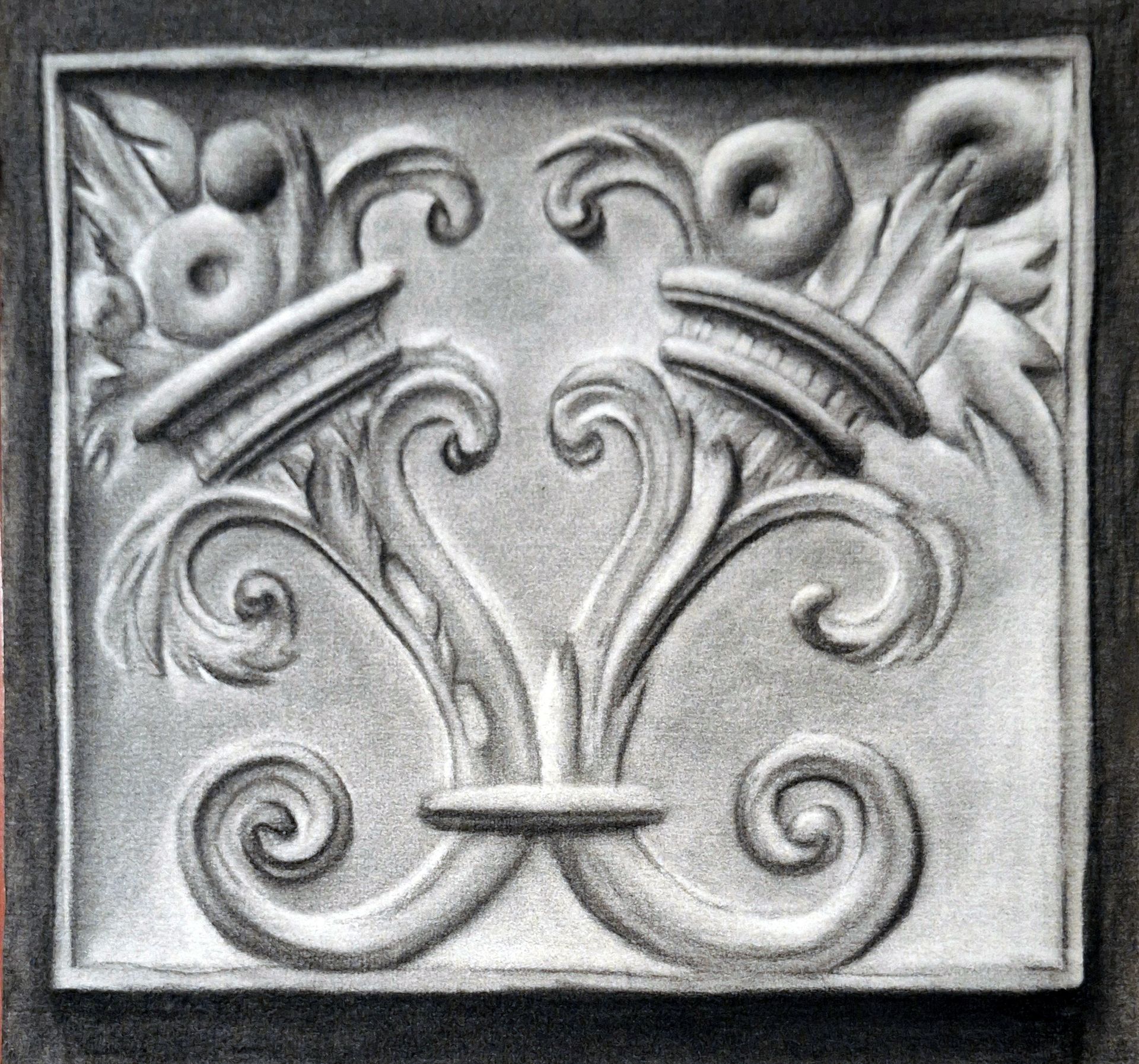 Un dibujo en blanco y negro de un diseño floral en una pared.