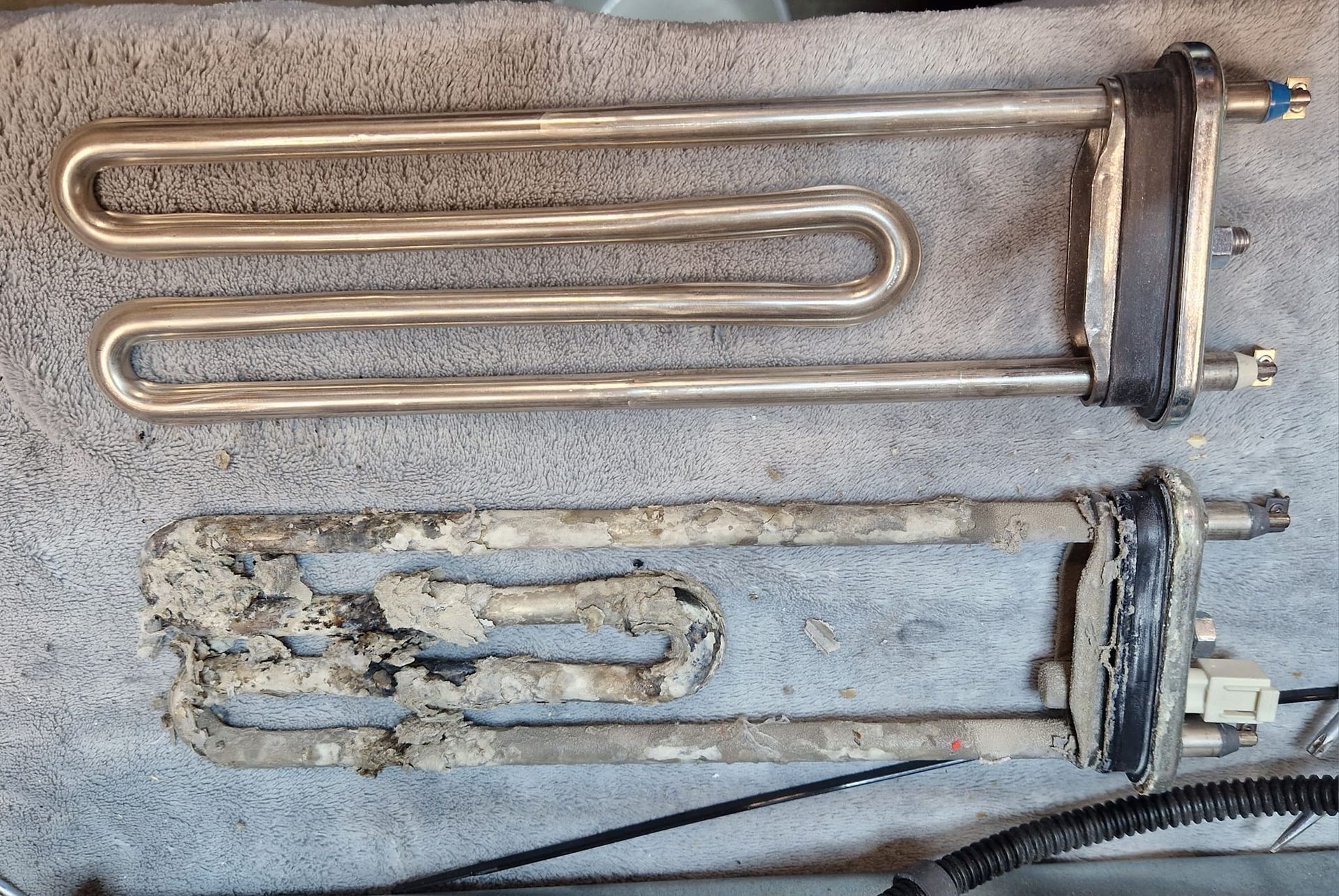 Une résistance de lave-linge thermoplongeur