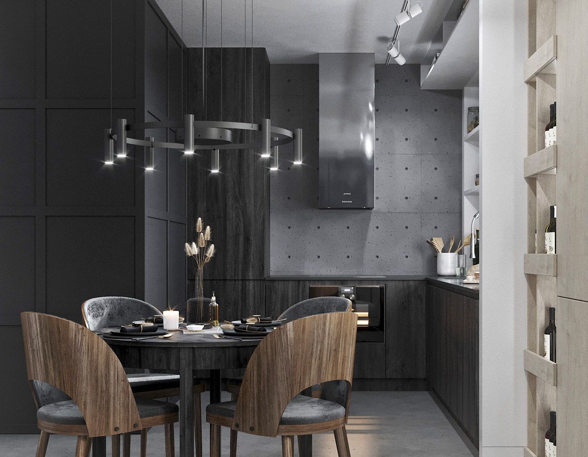 Un éclairage suspendu dans un style chandelier contemporain à l'intérieur d'une cuisine industrielle