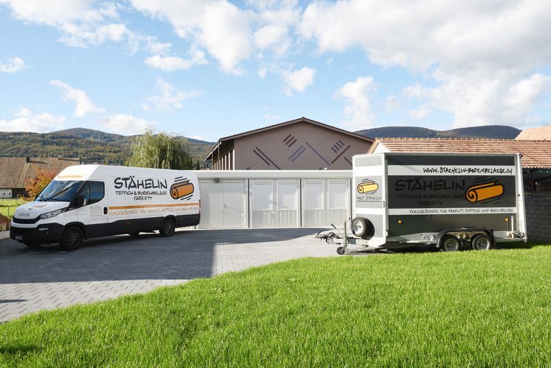 Fahrzeug und Anhänger von STÄHELIN Teppich & Bodenbeläge Parkett