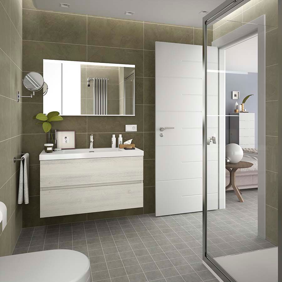 Un baño con inodoro, lavabo y espejo.