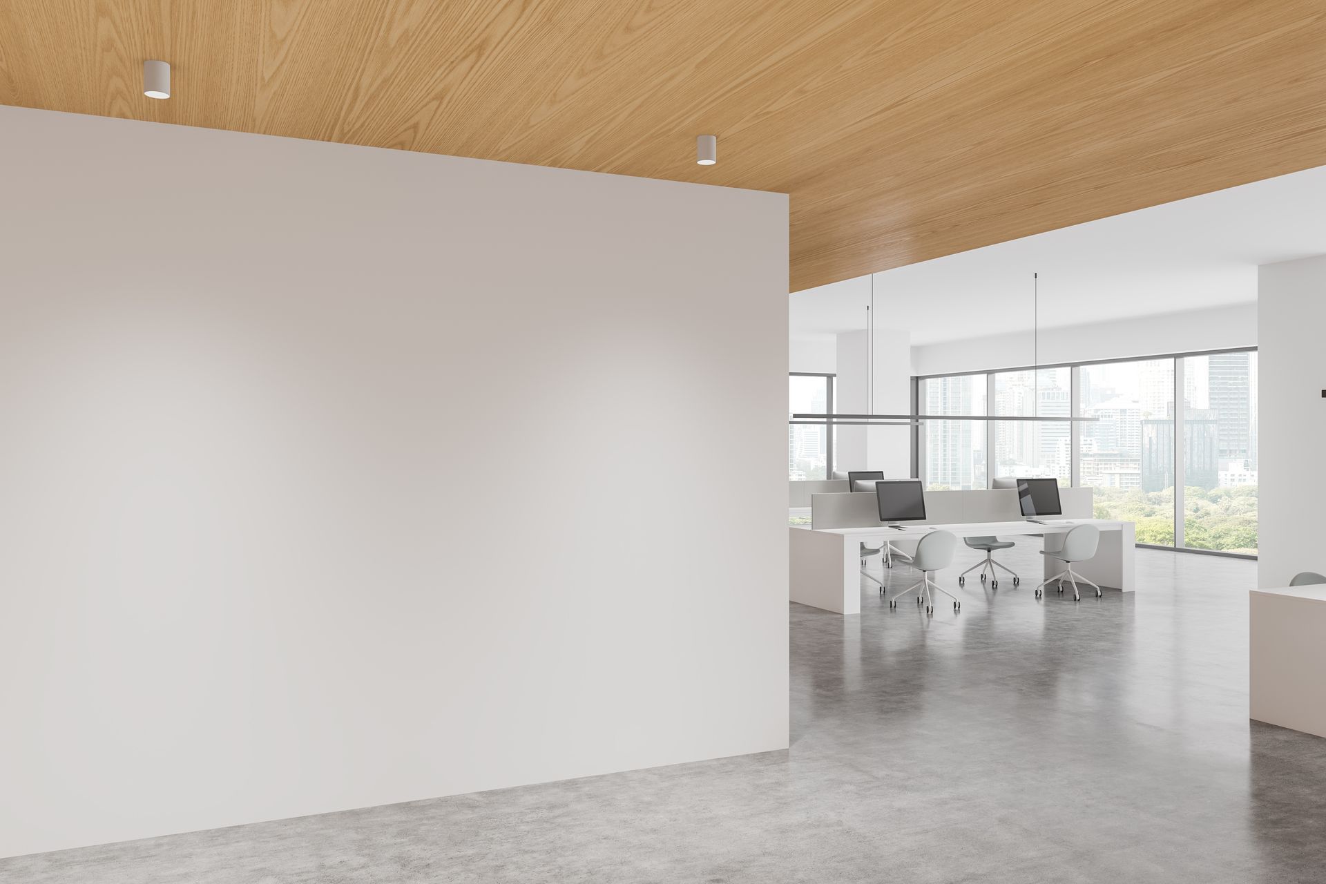 Bureau moderne avec cloison blanche.