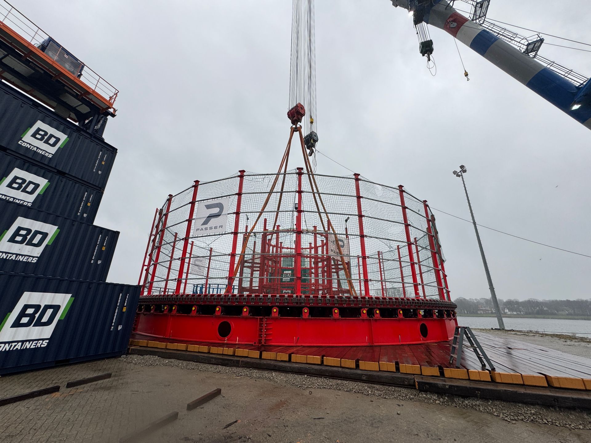 Port-side logistical support for heavy lift vessels in Antwerp.
