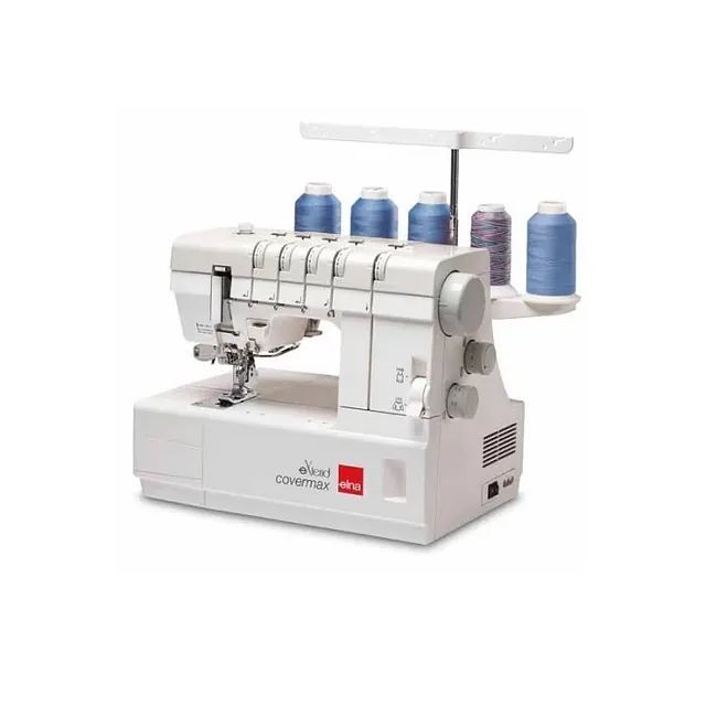 Una máquina de coser blanca con carretes de hilo azul y morado