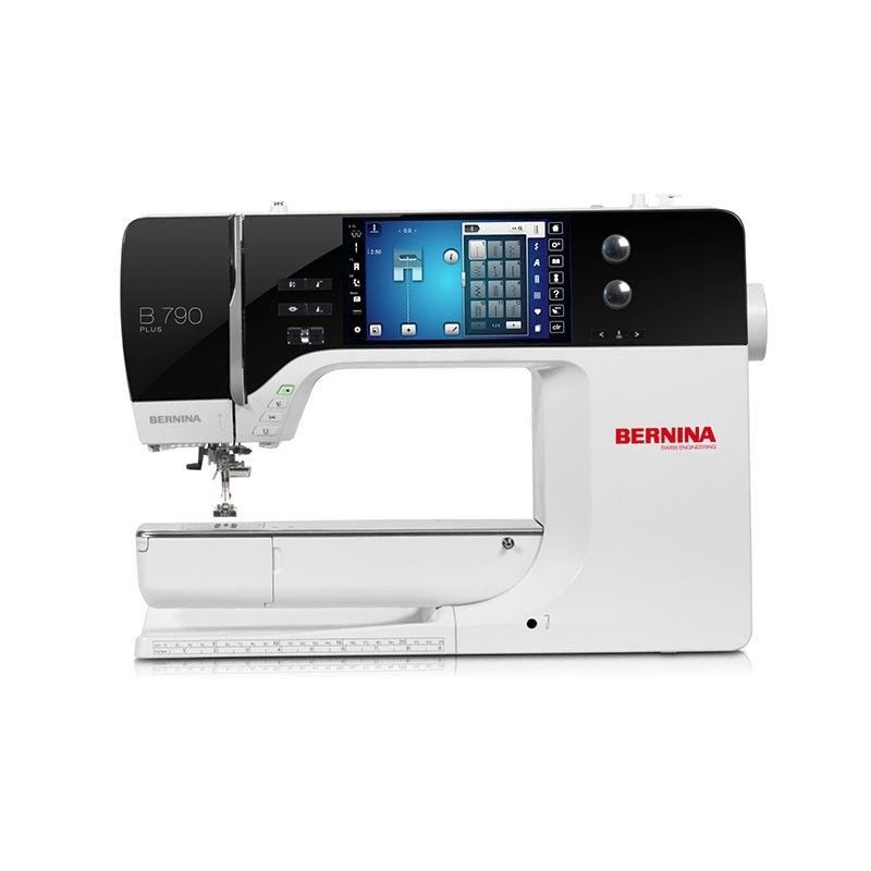 Una máquina de coser Bernina B700 está colocada sobre una superficie blanca.