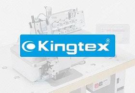 Una máquina Kingtex está colocada encima de una mesa.